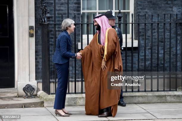 British Prime Minister Theresa May greets The Crown Prince of Saudi Arabia Mohammad bin Salman al-Saud on the steps of No.10 Downing Street, as he...