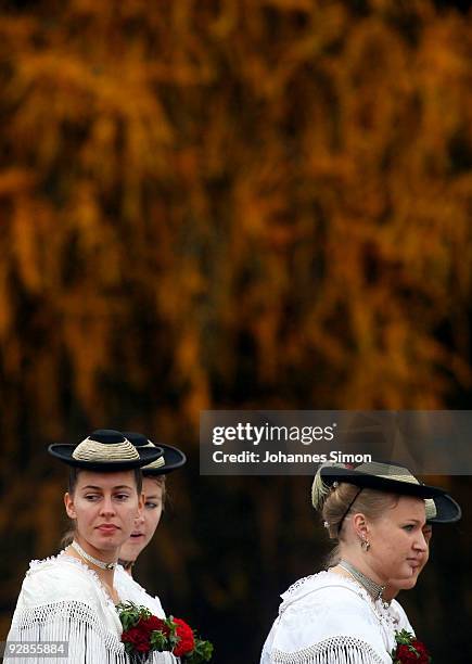 Women in traditional Bavarian dress take part in the so called Leonhardi Ride, a horse pilgrimage in honor of Saint Leonard de Noblac, on November 6,...