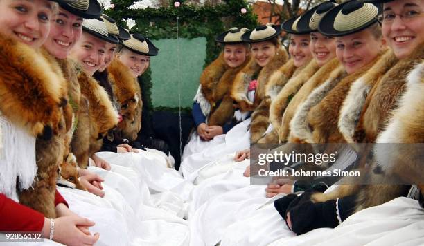 Women in traditional Bavarian dress take part in the so called Leonhardi Ride, a horse pilgrimage in honor of Saint Leonard de Noblac, on November 6,...