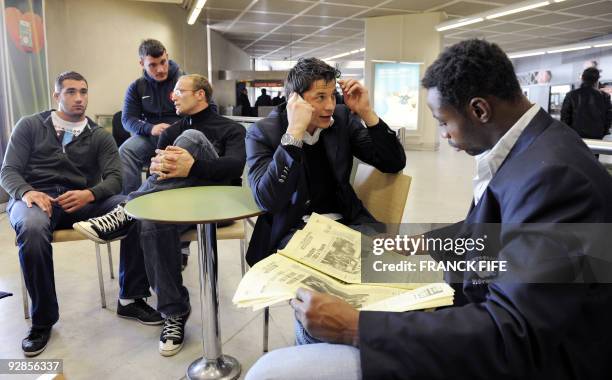 France's national rugby union team players Alexandre Lapandry, Thomas Domingo, Julien Bonnaire, Francois Trin-duc and Fulgence Ouedraogo are...