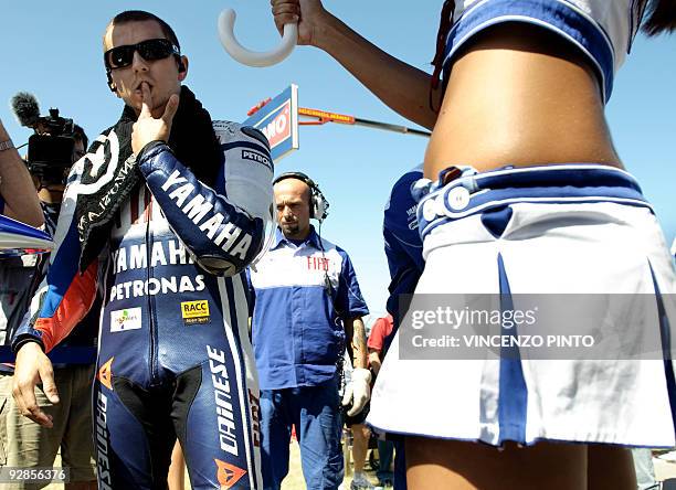 Spanish Yamaha rider Jorge Lorenzo gestures prior to the MotoGP race of the San Marino Grand Prix in Misano on September 6, 2009. Italian Yamaha...