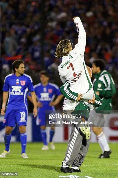 Diguinho of Brazil's Fluminese celebrates with team mate the victory against Universidade de Chile during their Copa Nissan Sudamericana...