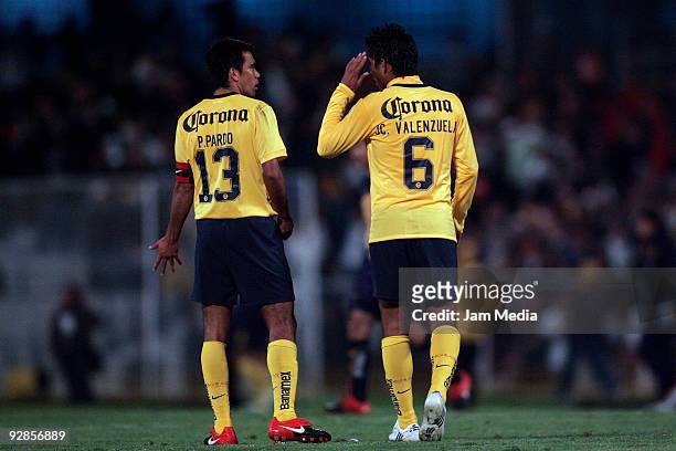 Pavel Pardo and Juan Carlos Valenzuela of Aguilas del America react after a missed chance of goal in a Mexican league Apertura 2009 soccer match...