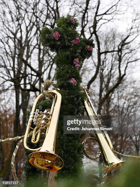 Trumpets, hanging beside a cross are pictured during the so called Leonhardi Ride, a horse pilgrimage in honor of Saint Leonard de Noblac, on...