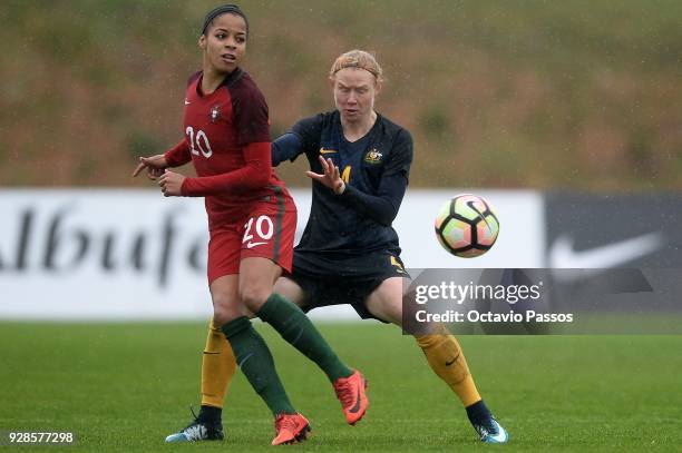 Clare Polkinghorne of Australia competes for the ball with Jessica Silva of Portugal during the 3rd place playoff Women's Algarve Cup Tournament...