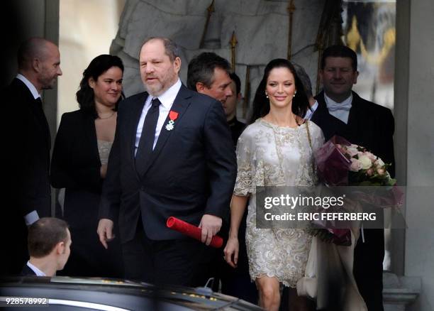 Harvey Weinstein , US producer of the Silent and black-and-white movie "The Artist" leaves the presidential Elysee Palace with his wife, Georgina...
