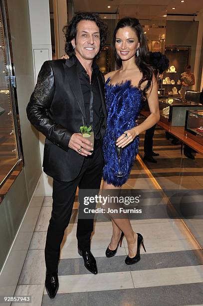 Steven Webster and Georgina Chapman pose for the camera during the Georgina Chapman for Garrard collection launch on November 4, 2009 in London,...