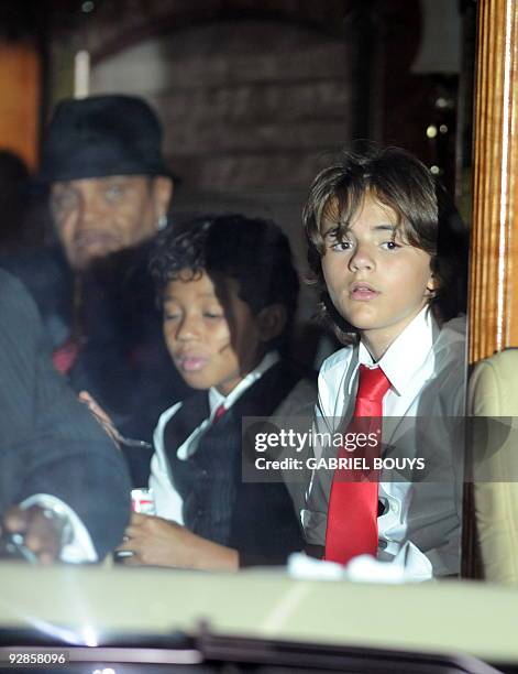 Michael Jackson's son Prince Michael and father Joe Jackson leave in a bus after Michael Jacksons burial ceremony in The Great Mausoleum at Glendale...