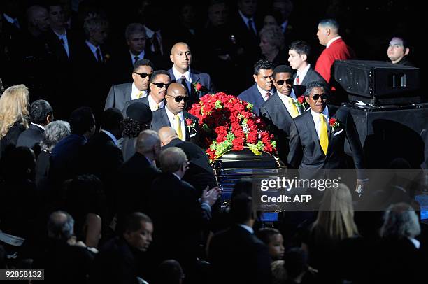 Michael Jackson's casket is brought out during public memorial service held at Staples Center on July 7, 2009 in Los Angeles, California. Jackson the...