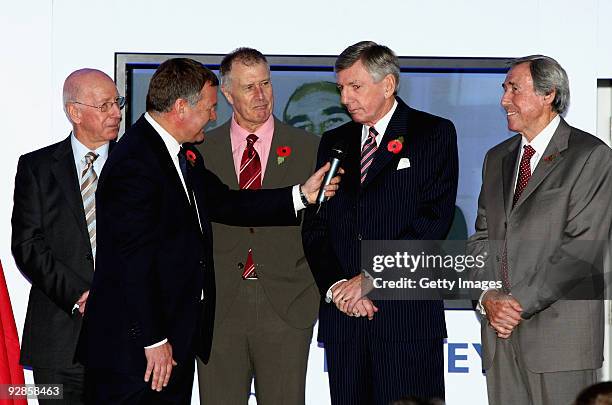 Ray Stubbs interviews Sir Bobby Charlton, Geoff Hurst, Martin Peters and Gordon Banks during the official unveiling of the sculpture of Sir Alf...