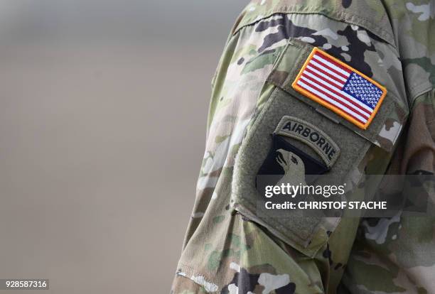Flag is pictured on a soldier's uniform during the 'Dynamic Front 18' exercise in Grafenwoehr, near Eschenbach, southern Germany, on March 7, 2018. -...