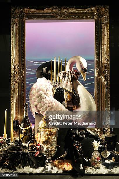 Newly unveiled Christmas window of Fortnum & Mason grocery store displays goods for sale on November 6, 2009 in Picadilly, London. Shops are...