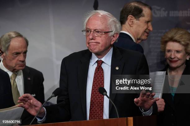 Sen. Bernie Sanders pauses during a news conference at the Capitol March 7, 2018 in Washington, DC. Senate Democrats held a news conference to...
