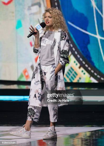 Becca Dudley on stage at We Day UK at Wembley Arena on March 7, 2018 in London, England.