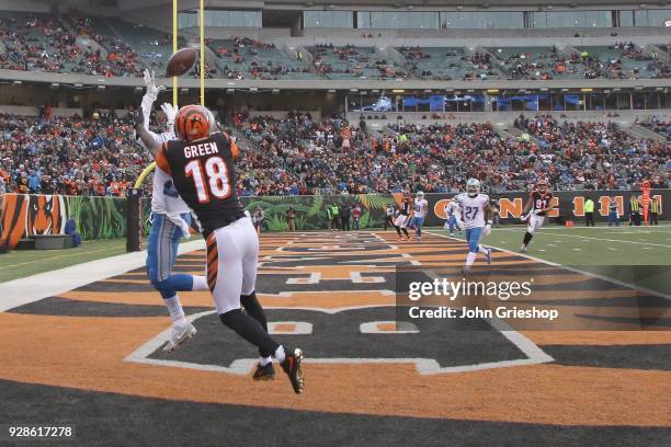 Green of the Cincinnati Bengals battles for the football against Darius Slay of the Detroit Lions during their game at Paul Brown Stadium on December...