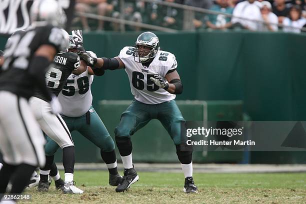 Offensive tackle King Dunlap of the Philadelphia Eagles blocks during a game against the Oakland Raiders on October 18, 2009 at Oakland-Alameda...