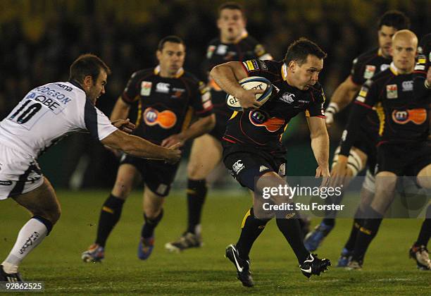 Dragons fly half Shaun Connor bursts through the Sharks defence to score the first try during the LV = Anglo Welsh Cup match between Newport Gwent...