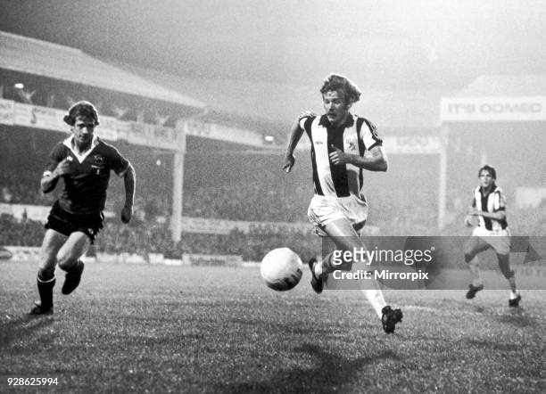 David Mills attacking the Manchester United goal area with Jimmy Nicholls in pursuit. West Bromwich Albion V Manchester United, score 2-0 to West...