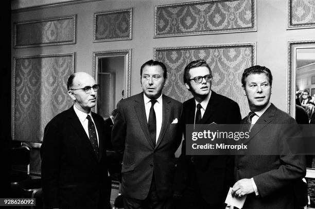 Billy Marsh, Bernard Delfont, Michael Grade, and Dennis van Thal attend a reception at Cafe Royal to celebrate EMI selling their London management to...