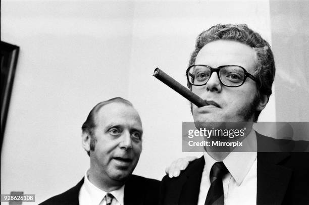 Michael Grade and his father Leslie Grade attend a reception at Cafe Royal to celebrate E.M.I selling their London management to Dennis van Thal,...