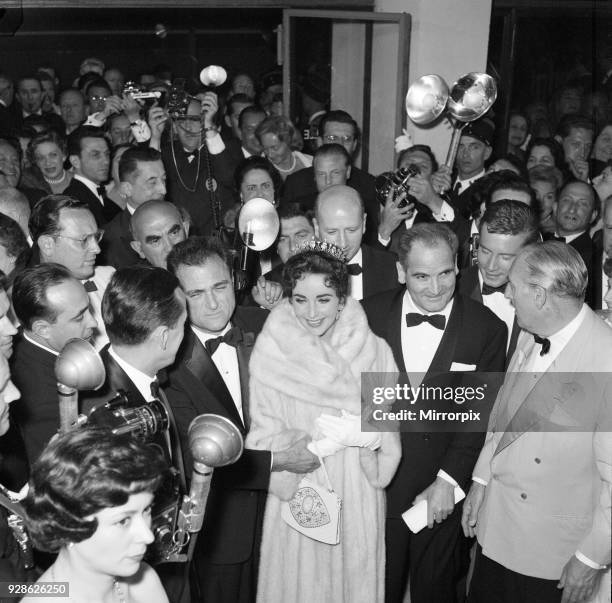Elizabeth Taylor and husband, film producer Mike Todd, pictured on opening night of the Cannes Film Festival 1957, where his is promoting new film...