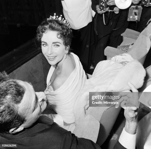 Elizabeth Taylor pictured on opening night of the Cannes Film Festival 1957, where her husband and film producer Mike Todd, is promoting new film...