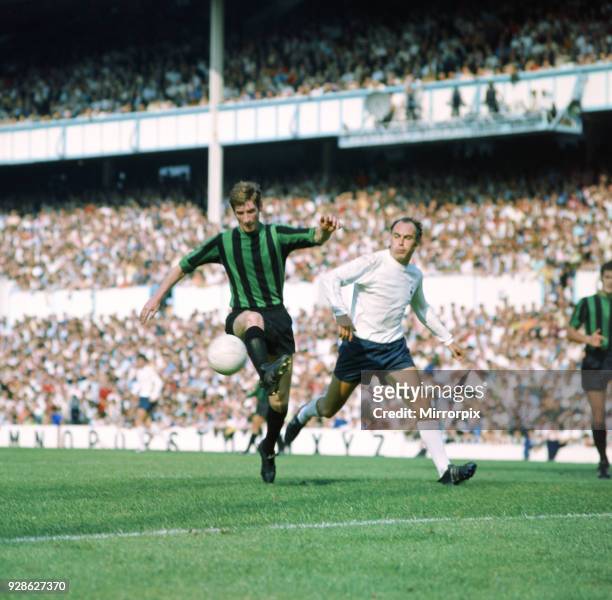 Coventry City footballer Geoff Strong in action with Alan Gilzean of Tottenham Hotspur during the two teams match at White Hart Lane, 30th August...