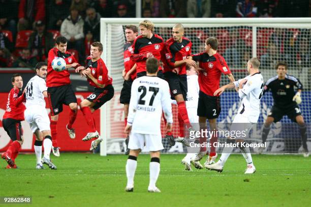 The team Leverkusen blocks a free-kick with Tranquillo Barnetta, Toni Kroos, Stefan Reinartz, Stefan Kiessling, Eren Derdiyok and Daniel Schwaab...