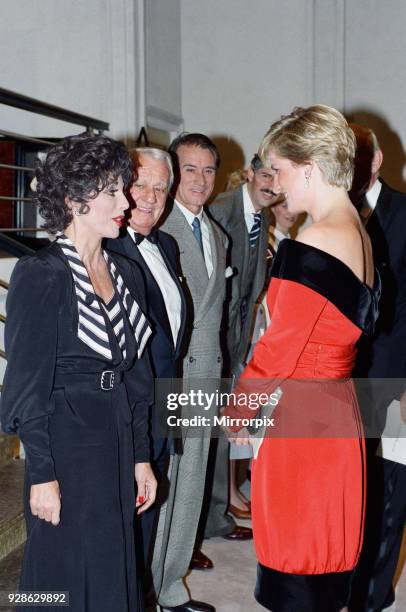 Princess Diana with actress Joan Collins after a charity performance of the play Private Lives at the Aldwych Theatre in London. The Princess wears a...