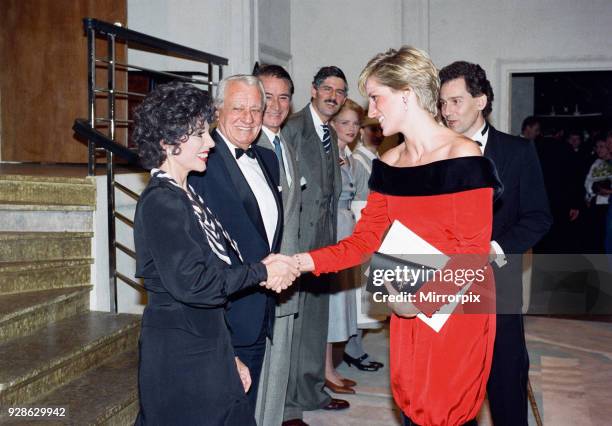 Princess Diana with actress Joan Collins after a charity performance of the play Private Lives at the Aldwych Theatre in London. The Princess wears a...