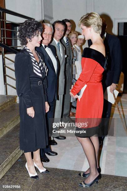 Princess Diana with actress Joan Collins after a charity performance of the play Private Lives at the Aldwych Theatre in London. The Princess wears a...