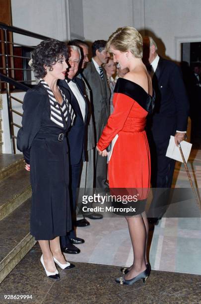 Princess Diana with actress Joan Collins after a charity performance of the play Private Lives at the Aldwych Theatre in London. The Princess wears a...