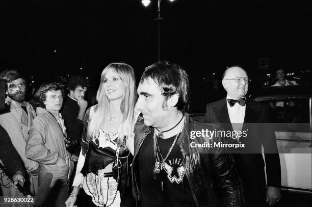 Keith Moon, drummer of the British rock group The Who, attending the the premier of the new film 'The Buddy Holly Story' in the West End with fiancee...