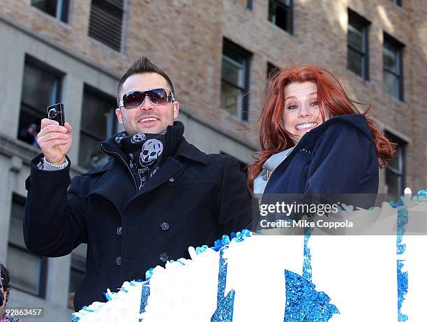 New York Yankees outfielder Nick Swisher actress Joanna Garcia attend 2009 New York Yankees World Series Victory Parade on November 6, 2009 in New...