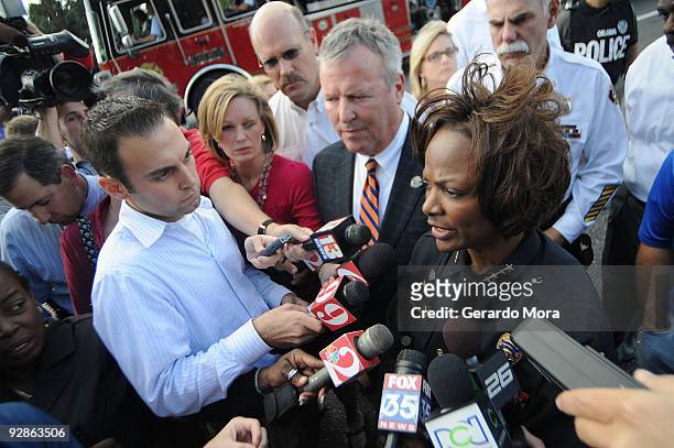Orlando Police Chief Val Demings and Orlando Mayor Buddy Dyer , speak during a press conference near of the Legions Place office building, where a...