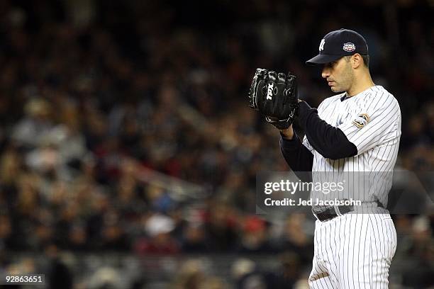 Starting pitcher Andy Pettitte of the New York Yankees gets set to throw a pitch against the Philadelphia Phillies in Game Six of the 2009 MLB World...