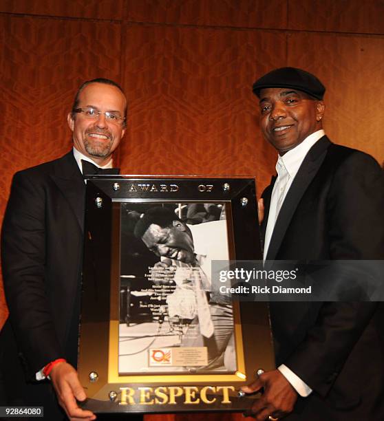 Driver Kyle Petty accepts award from Entertainment mogul Michael Mauldin at An Evening of Respect presented by The Big 'O' Foundation at The Woodruff...