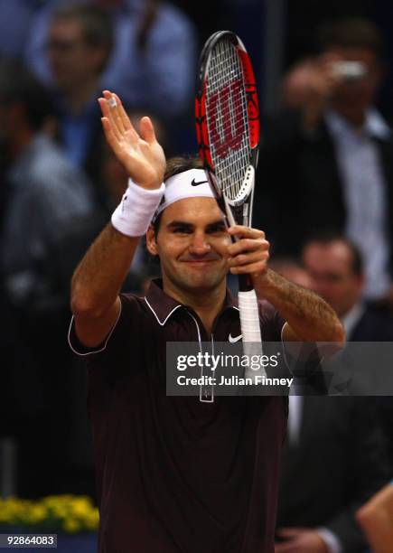 Roger Federer of Switzerland celebrates defeating Evgeny Korolev of Russia during Day Five of the Davidoff Swiss Indoors Tennis at St Jakobshalle on...