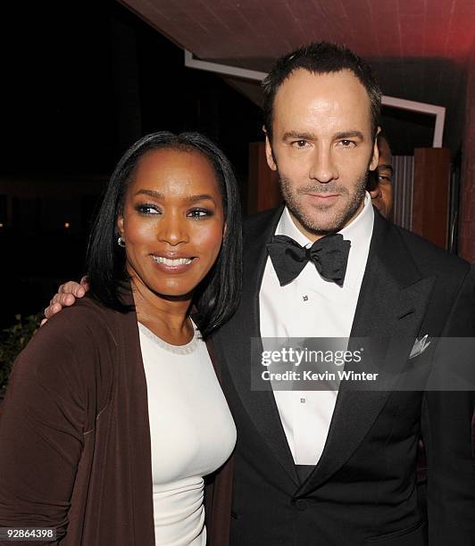 Actress Angela Bassett and director Tom Ford pose at the afterparty for the AFI FEST 2009 screening of the Weinstein Company's "A Single Man" at the...