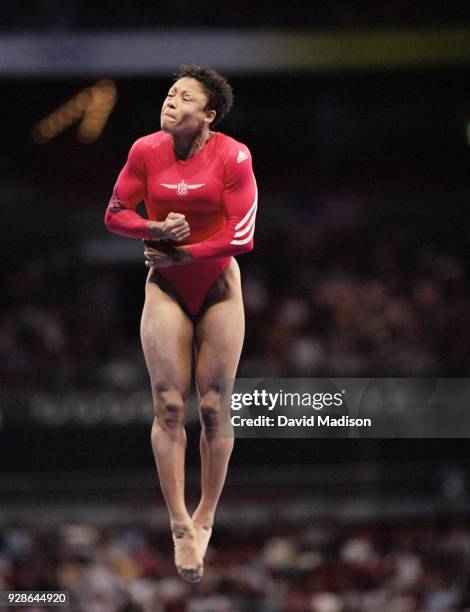 Dominique Dawes of the United States competes in the vault during the Women's Gymnastics event of the Olympic Games on September 16, 2000 in Sydney,...