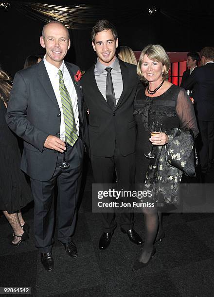 Sir Clive Woodward, Danni Cipriani and Jayne Woodward attends charity auction - 8Rocks - in aid of Cancer Research hosted by the Dallaglio Foundation...