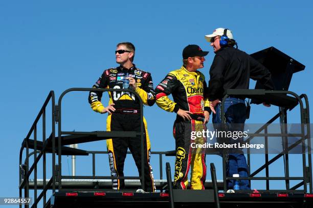 Jeff Burton, driver of the Caterpillar Chevrolet, Clint Bowyer, driver of the Cheerios/Hamburger Helper Chevrolet, and RCR Team owner Richard...