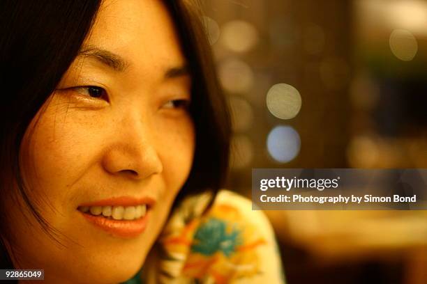 close up of woman at night - suncheon stock pictures, royalty-free photos & images