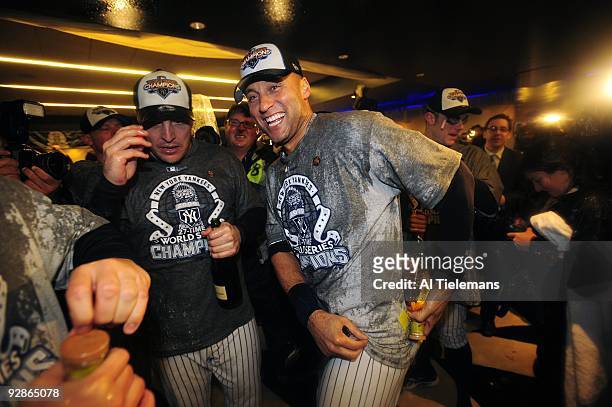World Series: New York Yankees Derek Jeter victorious in locker room with Eric Hinske after winning game vs Philadelphia Phillies. Game 6. Bronx, NY...