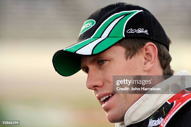 Carl Edwards, driver of the Ortho Ford, stands on pit road during qualifying for the NASCAR Nationwide Series O'Reilly Challenge at Texas Motor...