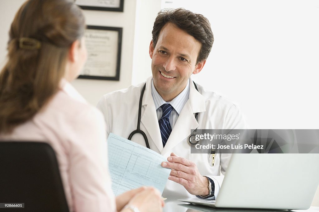 Doctor speaking with female patient