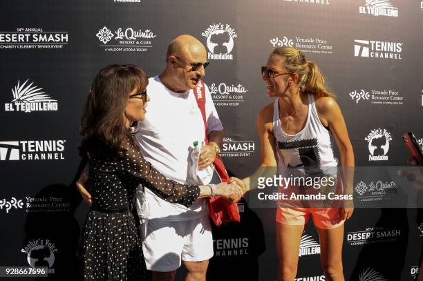 Robin Jameson McGraw, Dr. Phill McGraw and Victoria Azarenka arrive at The 14th Annual Desert Smash Celebrity Tennis Event on March 6, 2018 in La...