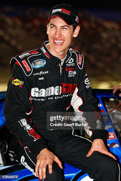 Joey Logano, driver of the GameStop/WWE Smackdown Toyota, stands on pit road during qualifying for the NASCAR Nationwide Series O'Reilly Challenge at...