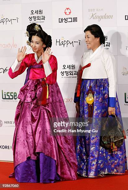 South Korean actress Seo Dam-Bi and "Hanbok" designer Park Sul-Yeo attends the 46th Daejong Film Awards at Olympic Hall on November 6, 2009 in Seoul,...