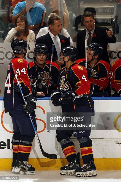 Assistant Coach Mike Kitchen and Jim Hulton of the Florida Panthers direct their team from the bench against the Carolina Hurricanes at the Bank...
